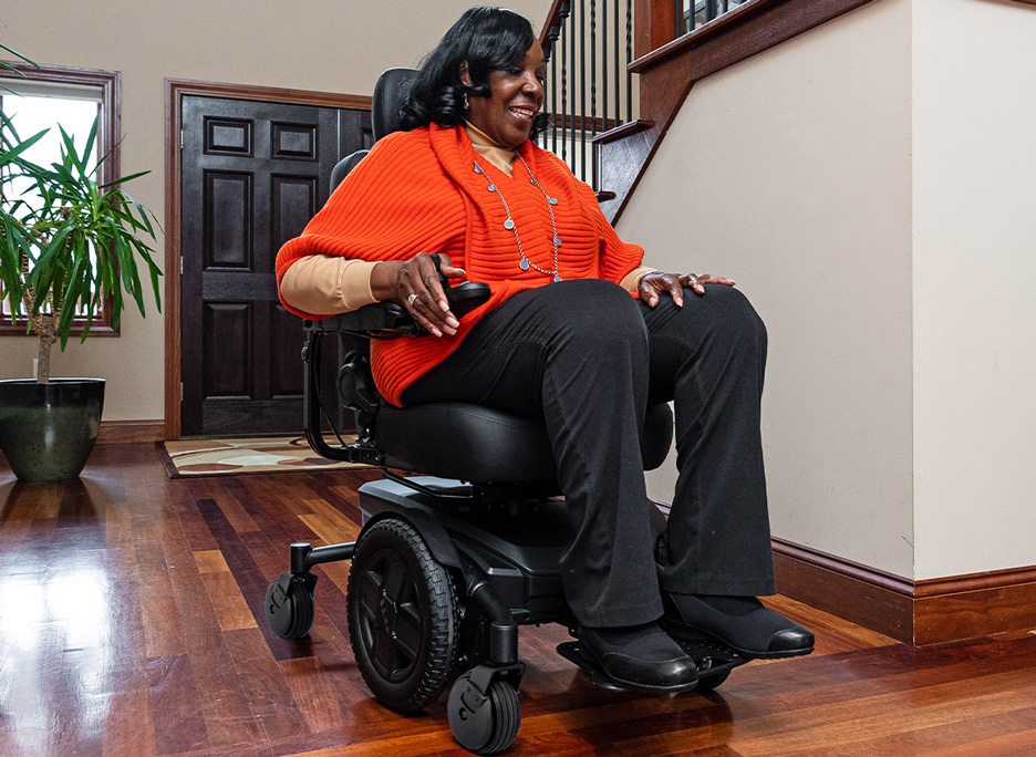 Person using power wheelchair to turn a corner to show best power wheelchair tips